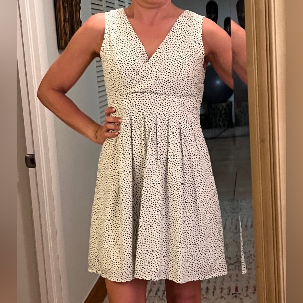 Perfect summer Madison Jules dress. Light cream with navy polka dots. Medium